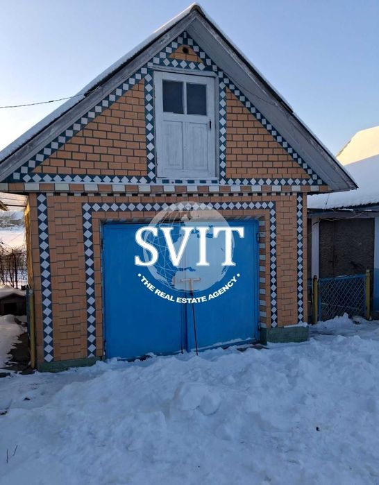 Продам будинок  в центрі села Нігин