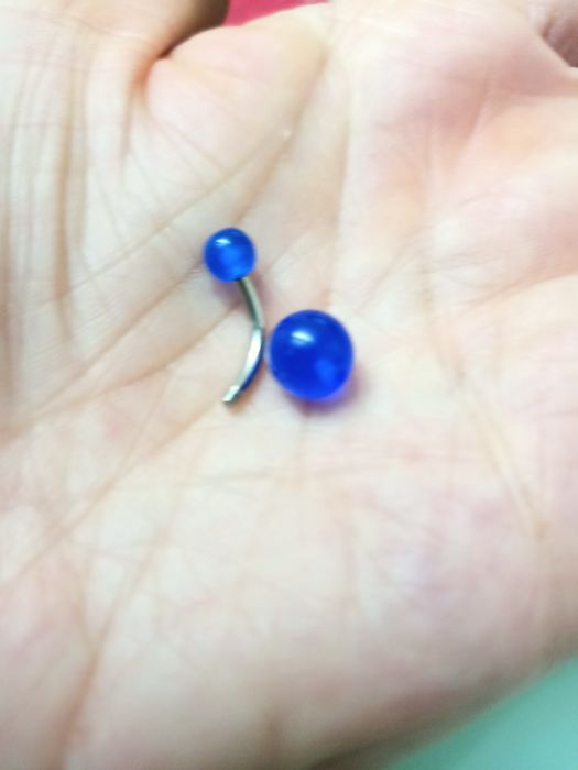 Piercing  umbigo fluorescente