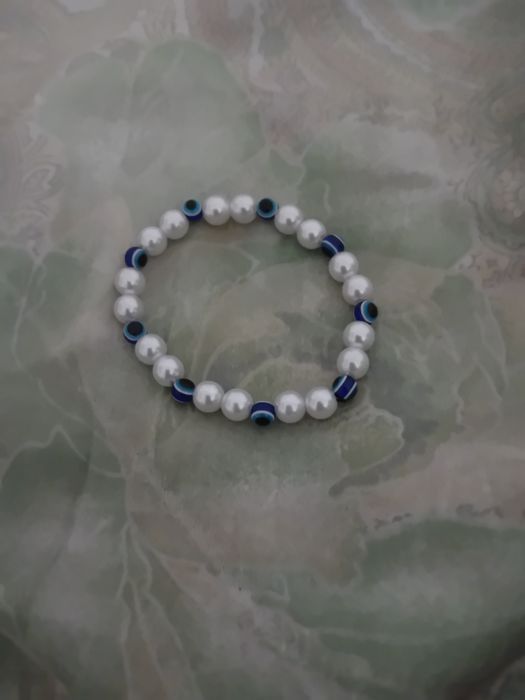 Pulseira com olho grego