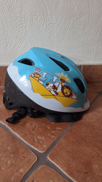 Dwa  kaski rowerowe dziecięce+ fotelik na rower