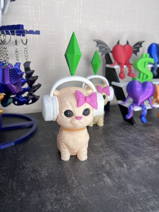 Котик в навушниках з Sims cat dance кіт з сімс