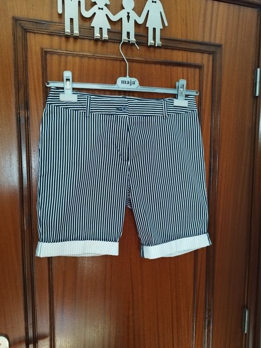 Vestido , blusa, calções  e casaco