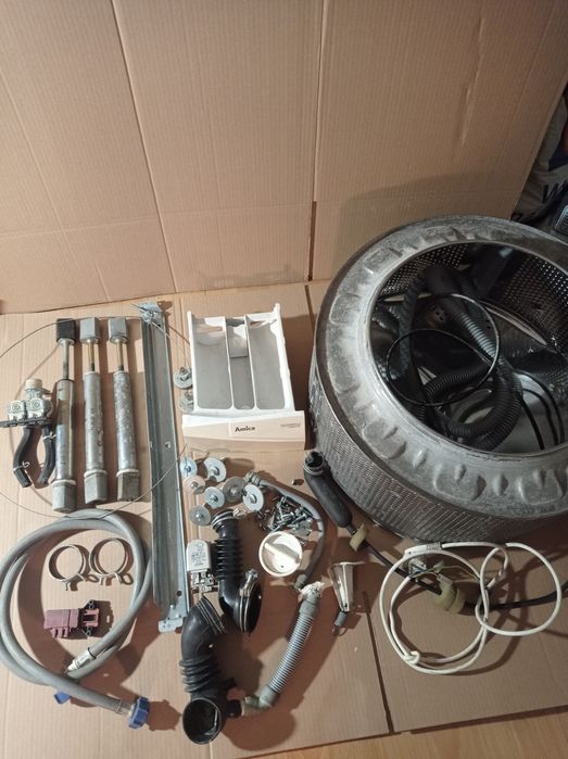 Części zamienne do pralki Amica AWST10L szuflada wąż bęben korek