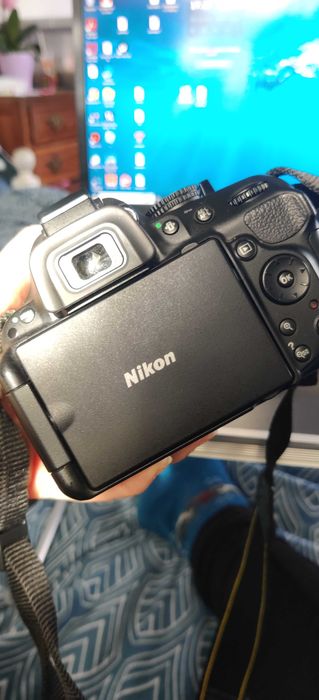 Nikon 5200, Lente, 2 baterias e uma mochila e mais coisas