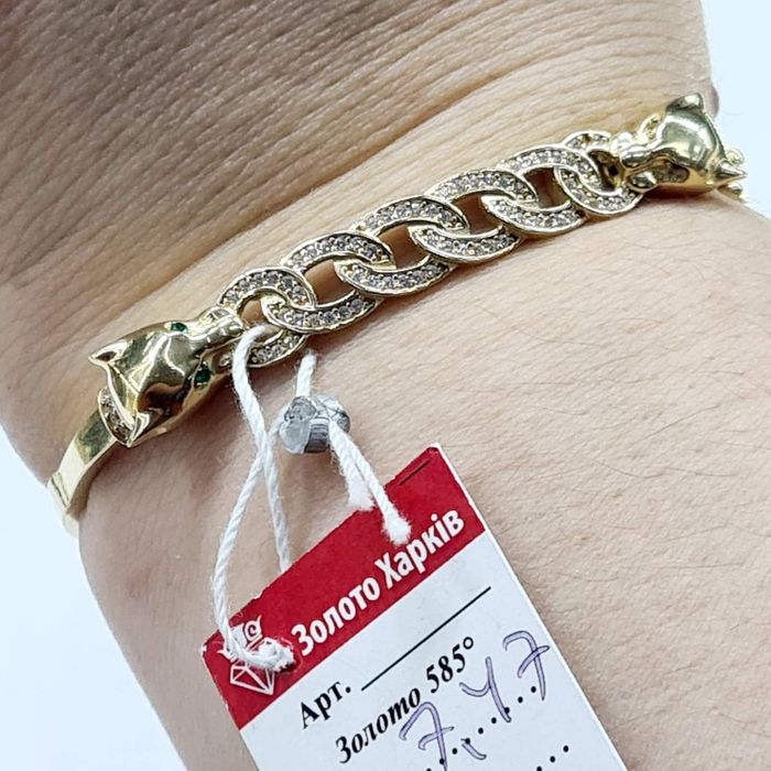В продаже золотые браслеты-скобы