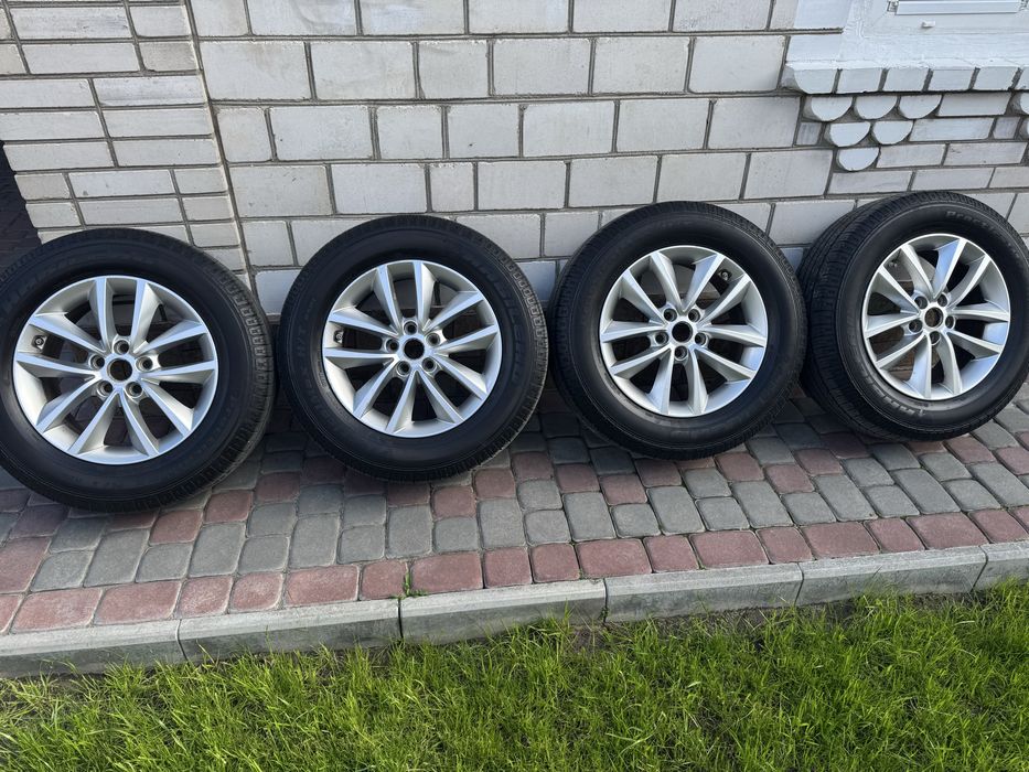 Комплект оригінальних дисків з шинами 5.114.3 R17.