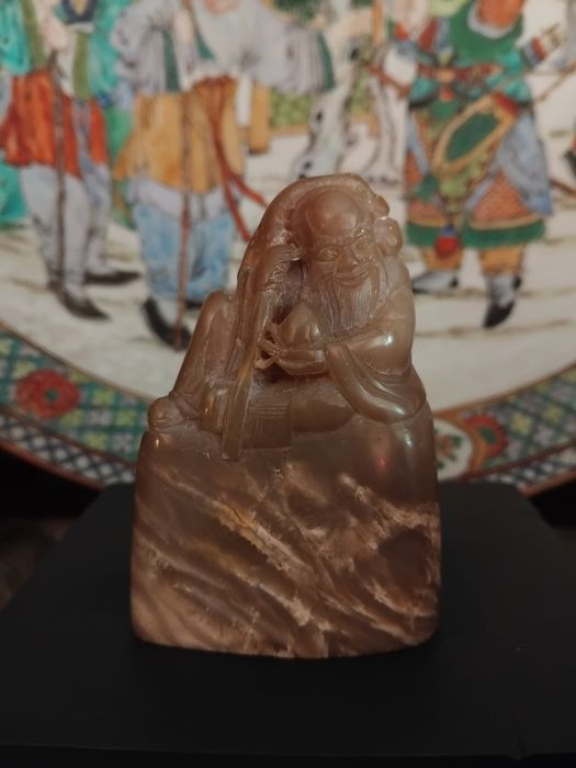 Figura de Imortal em pedra dura.