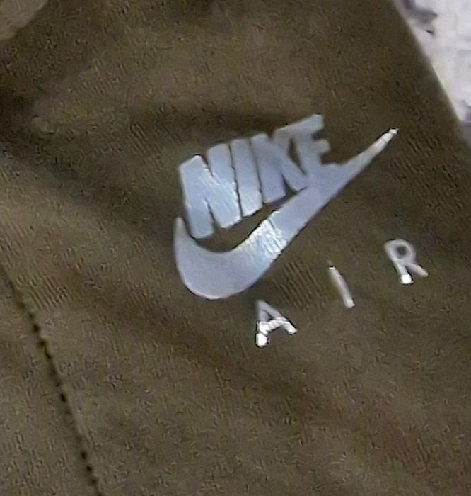 Legginsy bawełniane z nadrukiem khaki ," Nike"