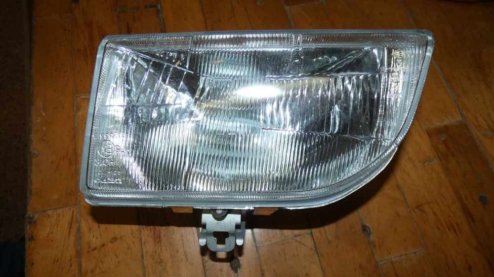 Farol esquerdo Ford Fiesta 1994