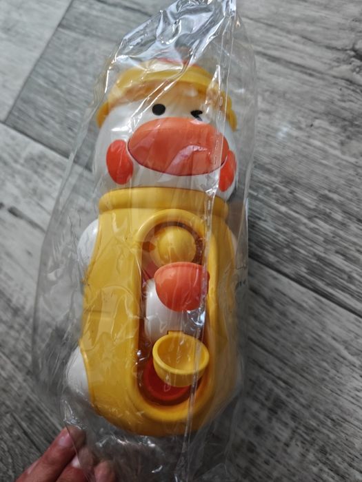 Іграшка каченя з водними млинами на присосках