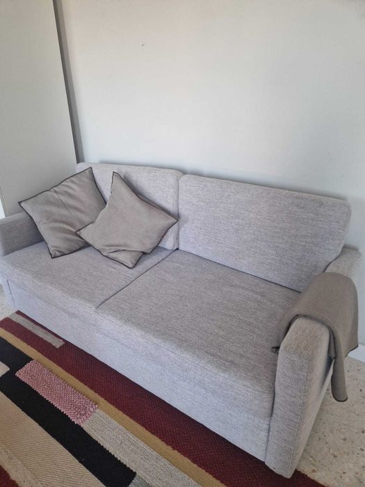 Sofá cama cinzento