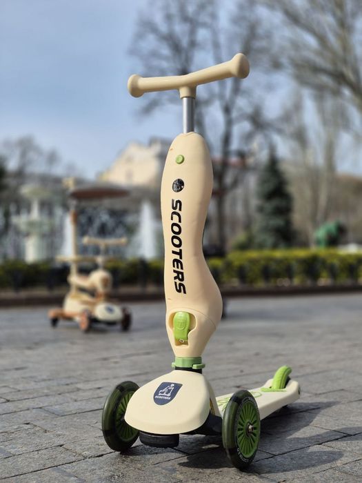 Стильний та модний самокат трансформер з батьківськой руч