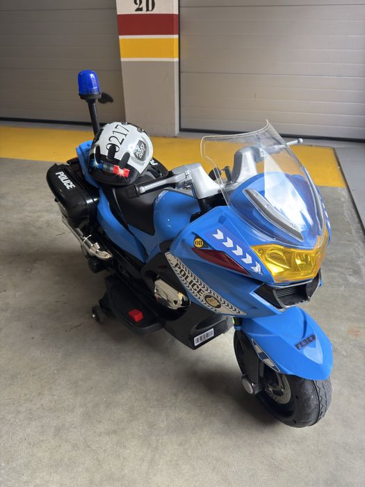 Mota de policia Criança