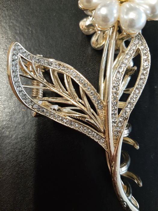 Mola de cabelo flor dourada nova