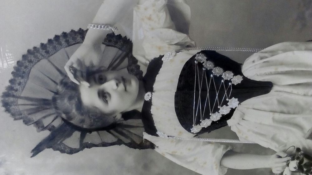 Hand-painted portrait photograph from the early 20th century, over 100 years old, original, with change visible64575361516546121