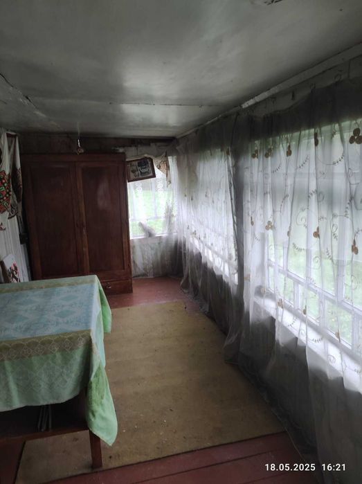 Житловий будинок та земельна ділянка 55,3 сот. с.Козьова