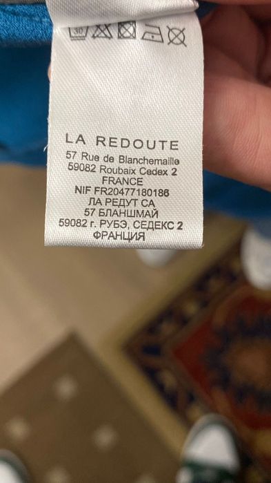 Blazer de cor azul turquesa.