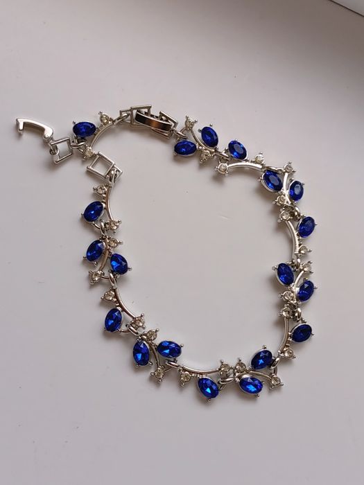 Bransoletka srebrny kolor niebieskie cyrkonie