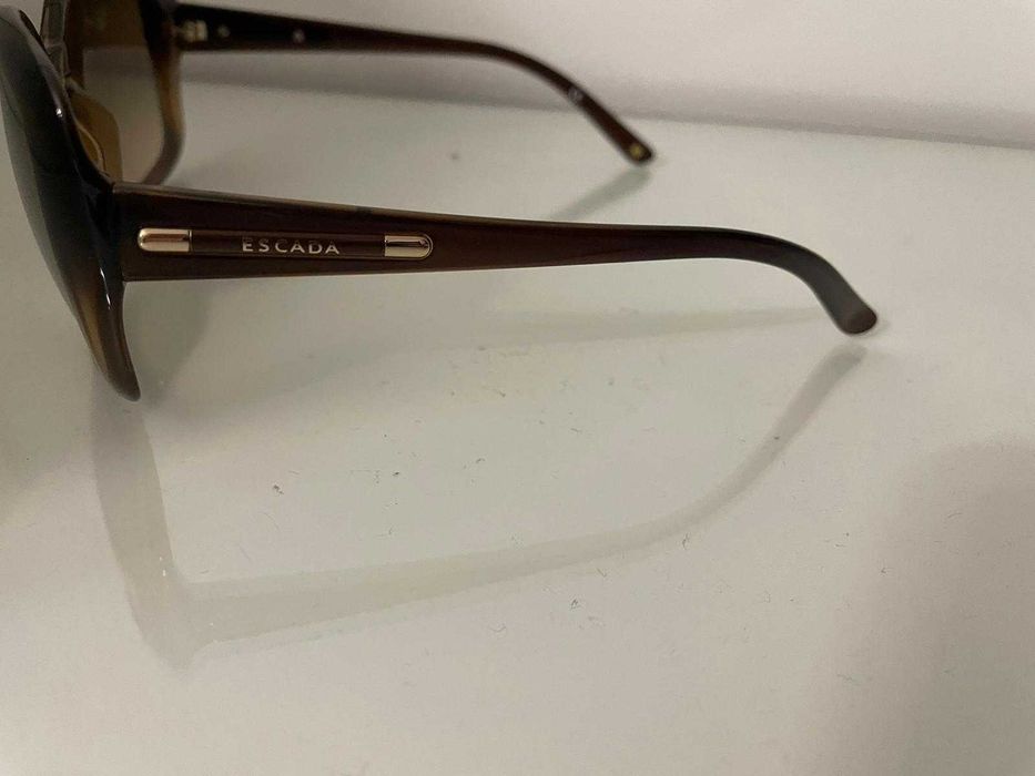 Óculos de sol marca "escada"