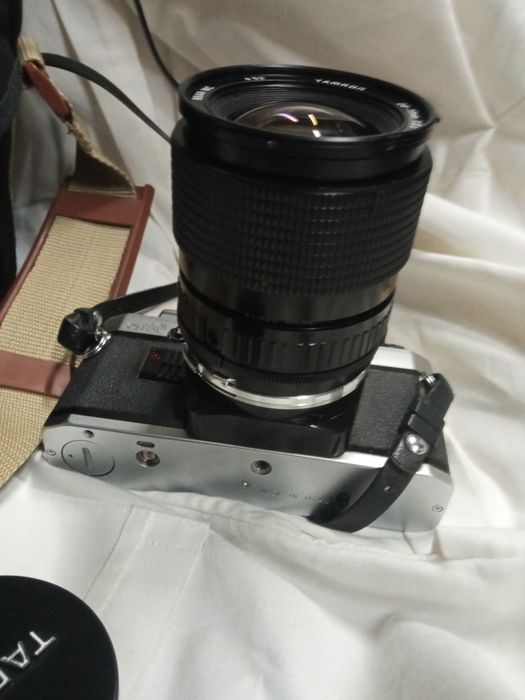 Muito boa. Máquina fotográfica, Olimpus,com objetiva. a funcionar.