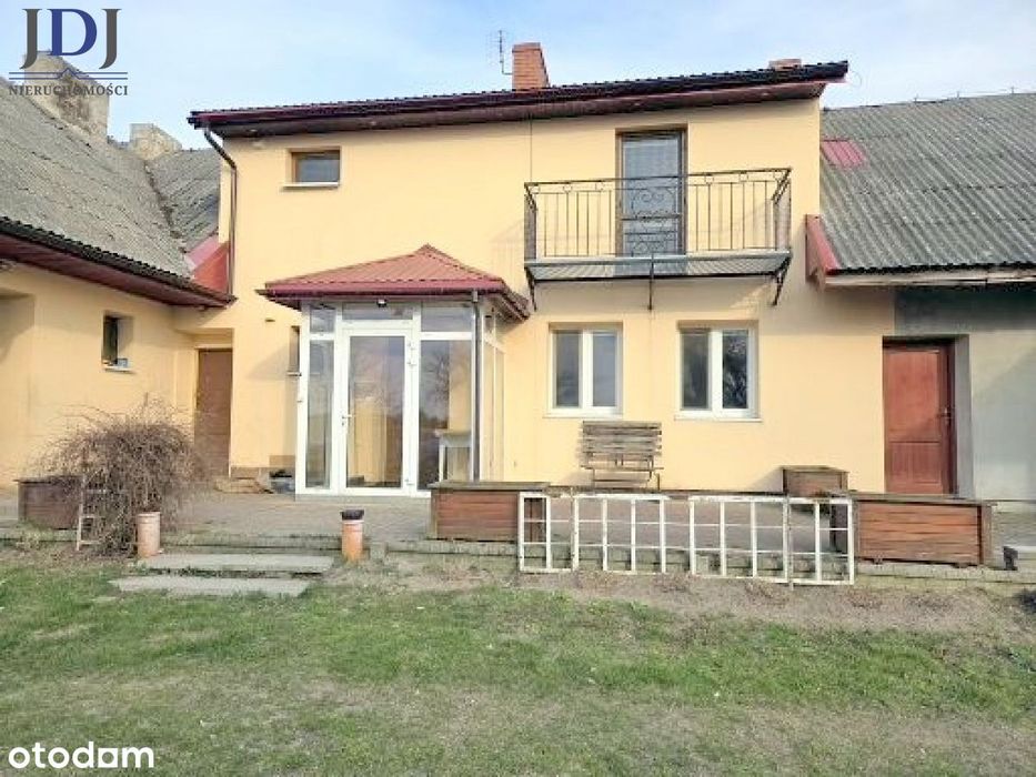 Dwa mieszkania, działka 14 ar, brak czynszu.