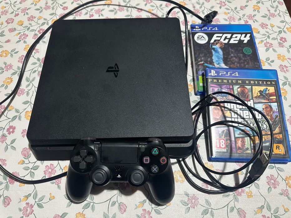 PlayStation 4 (1TB) com comando e 2 jogos