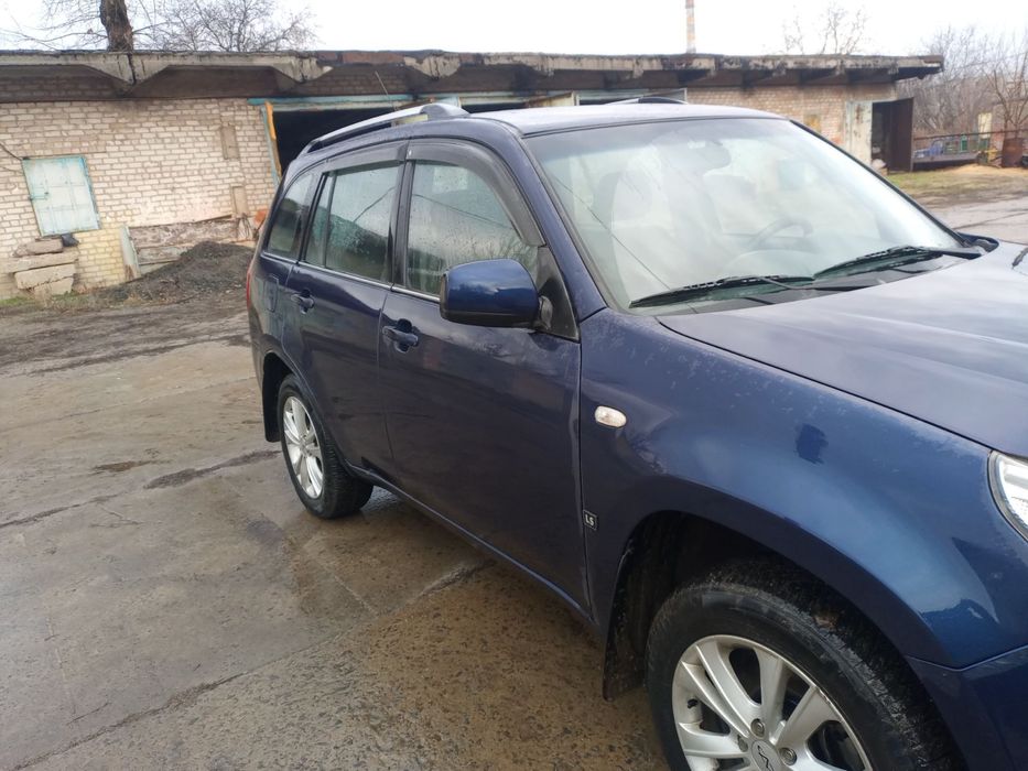 Автомобиль Черт Тиго