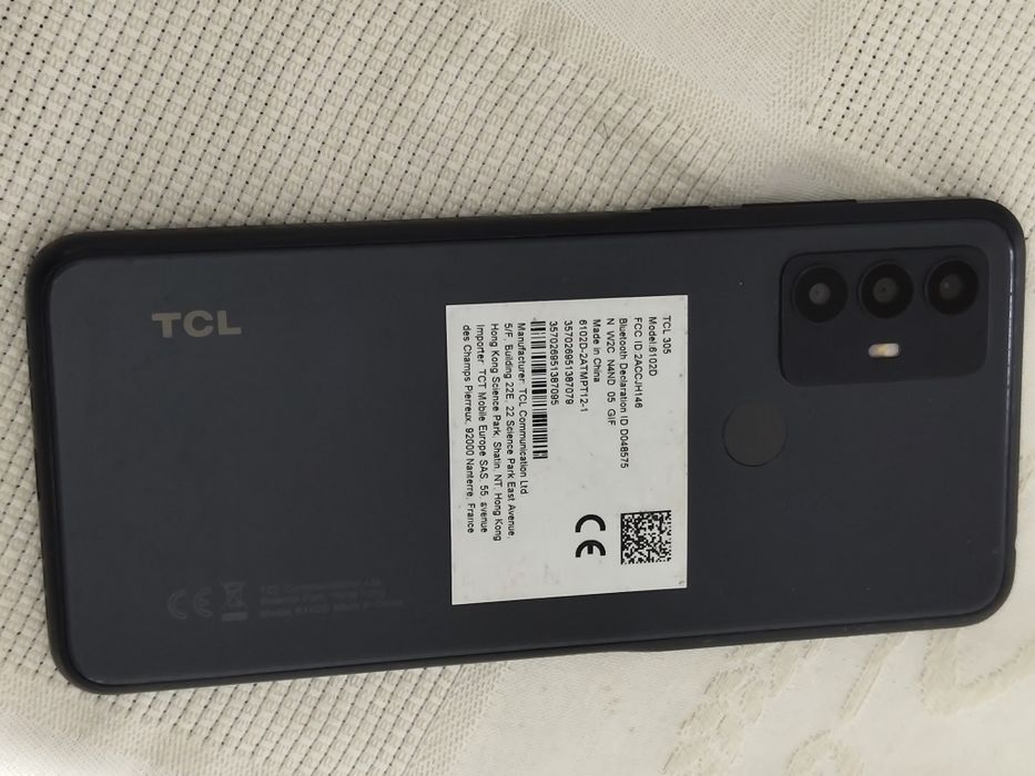 TCL305  com fones incluídos