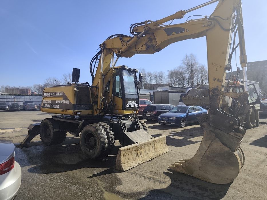 Cat M312 koparka kołowa