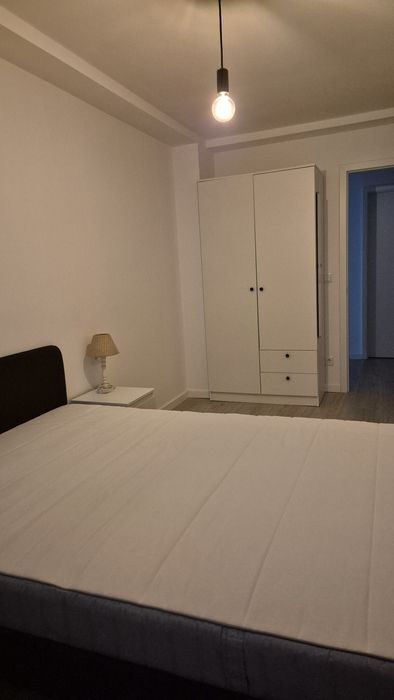 Quarto com cama dupla em T3  com sala