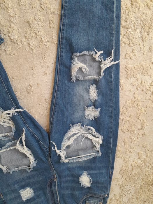 Spodnie mom jeans dziury przetarcia bawełna jeansy m l modne