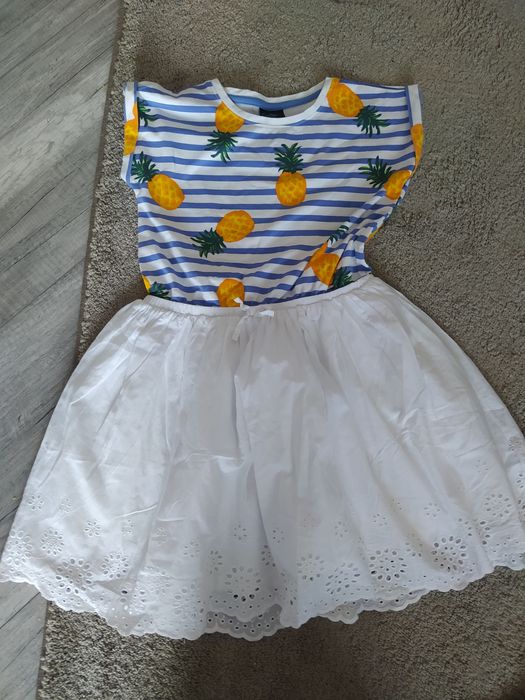 Piękna sukienka 128/134../25zł