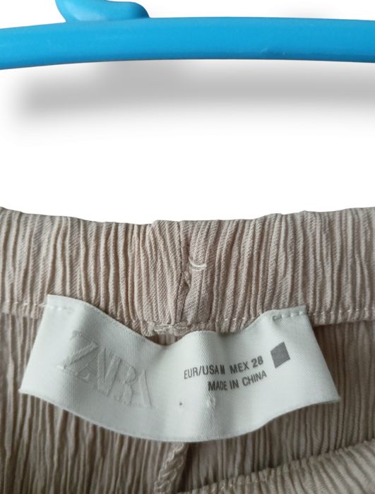Letnie materiałowe spodnie Zara r.M