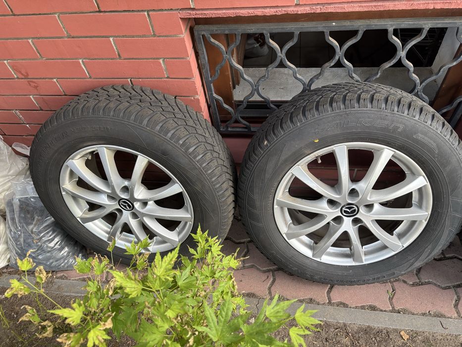 Komplet felgi opony wielosezon super stan Falken