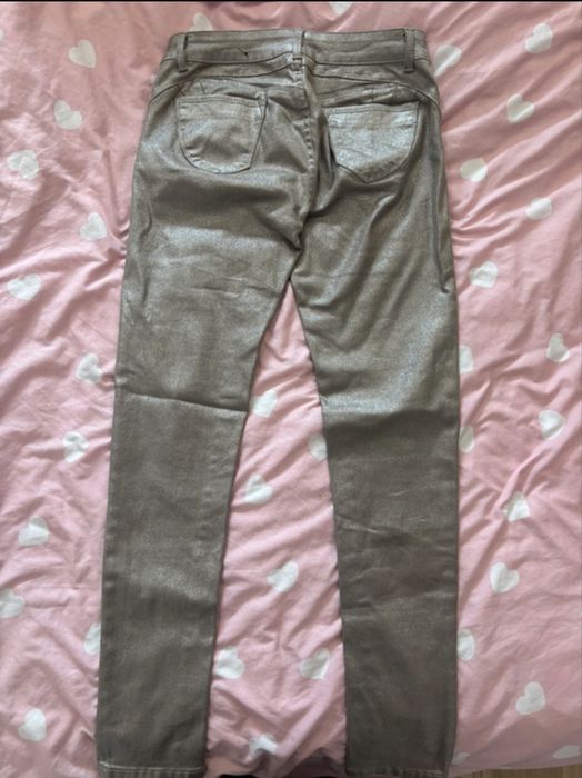 Spodnie rurki złote