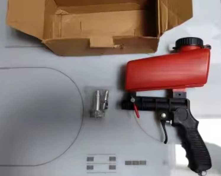 Pistola pistolas ar, lavagem e areia