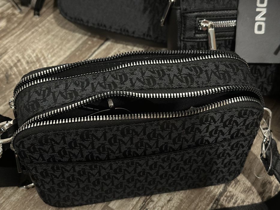 Оригінальна сумка Icono унісекс з еко-шкіри 550 грн Guess Gucci