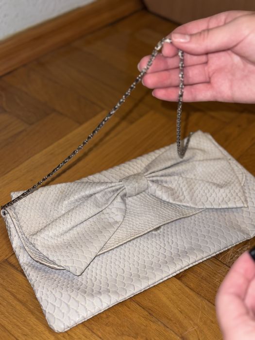 Клатч сірий з бантом New Look