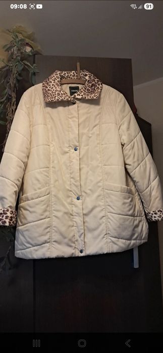 Kurtka wiosenna stan idealny kremowa wykończenie panterka