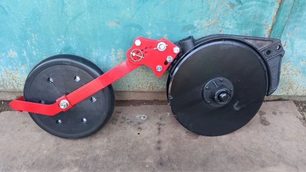 Запчастини сівалки СЗ Сошник прикатка