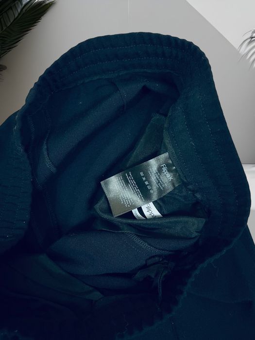 Filippa K roz. L damskie granatowe eleganckie spodnie