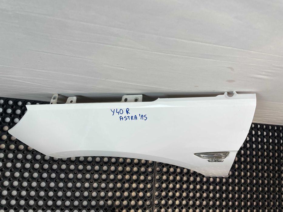 Błotnik przód przedni lewy opel astra v k kod lakieru: y40r 2015-