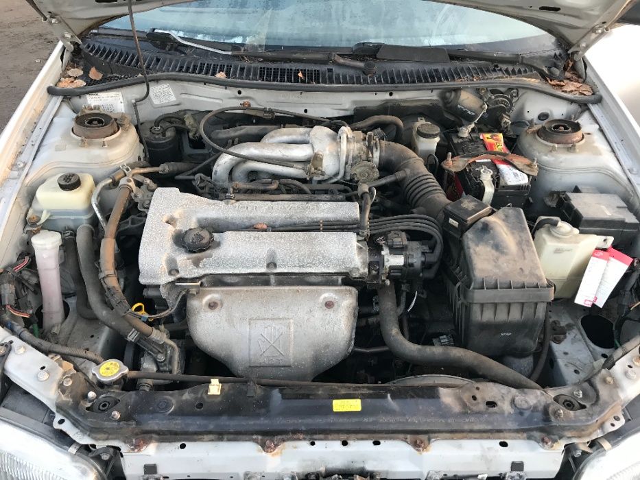 Mazda 323 F  BA 1,5 бензин /  капот