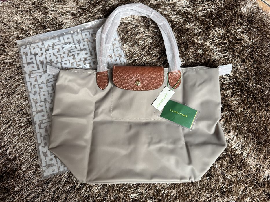Longchamp beje le pliage