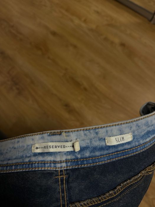 Niebieskie jeansy Reserved