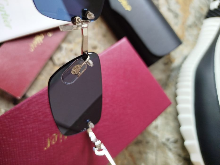 Солнцезащитные очки Cartier