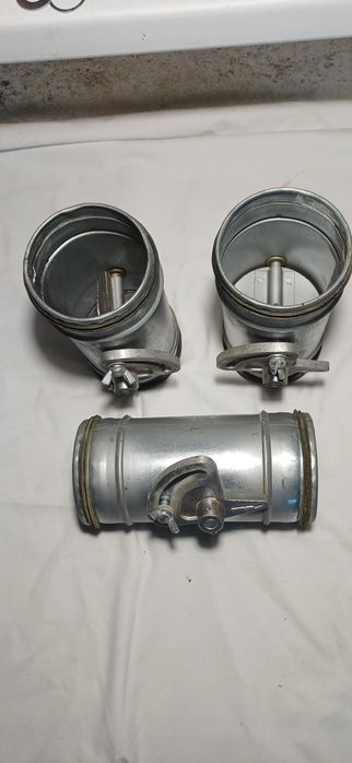 Trzy przepustnice wentylacyjne 100 mm