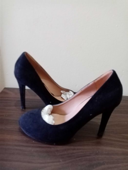 Sapatos seaside como novos