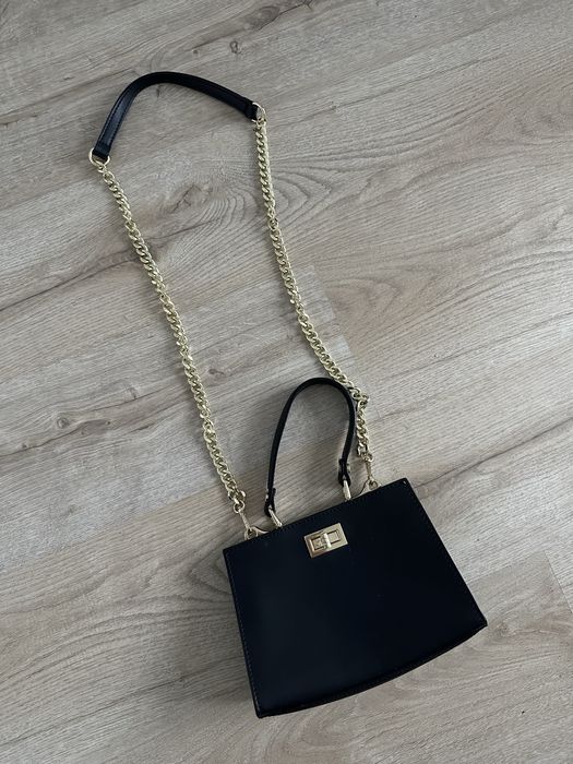 Skórzana mini torebka z rączką Ryłko