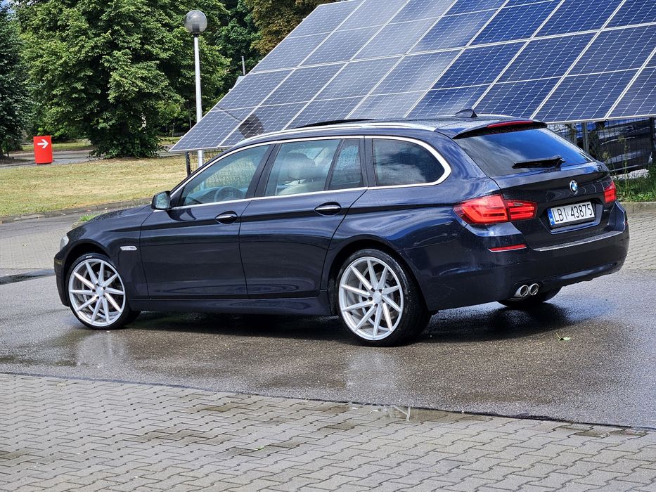 BMW F11 2012 photo 4